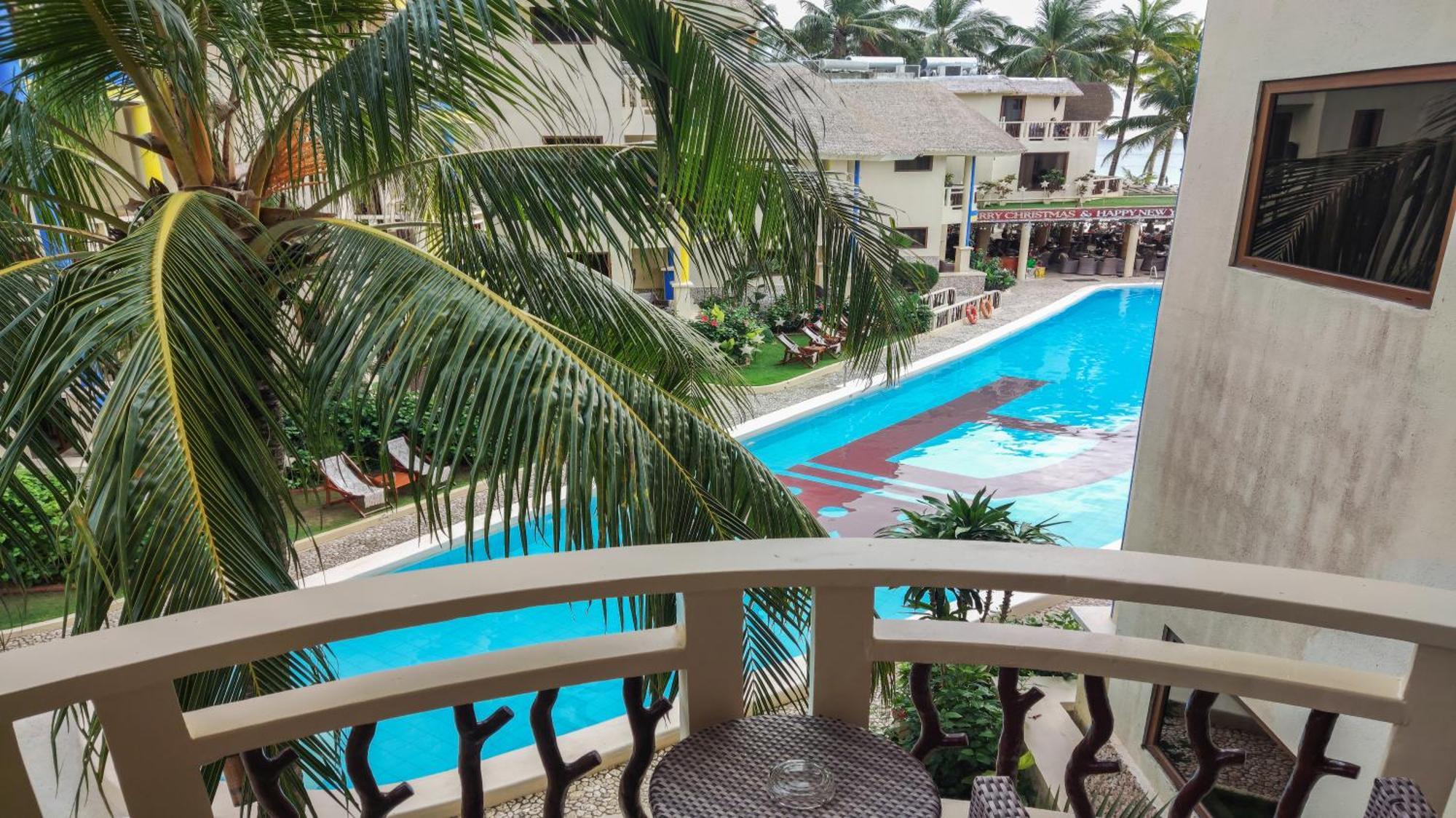 Ambassador In Paradise Balabag  Bagian luar foto The pool at the hotel